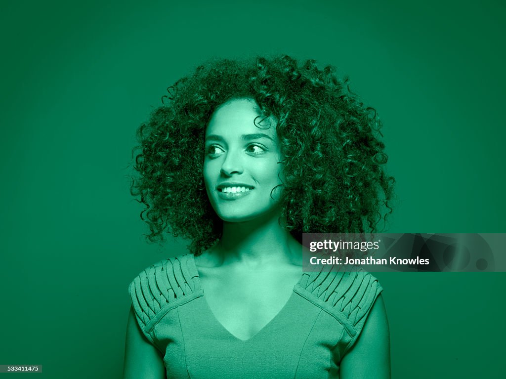 Portrait of a dark skinned female,looking away