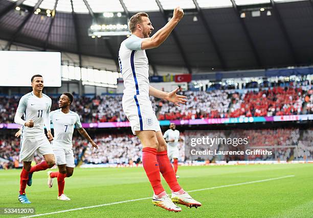 Harry Kane of England celebrates scoring the opening goal during the International Friendly match between England and Turkey at Etihad Stadium on May...