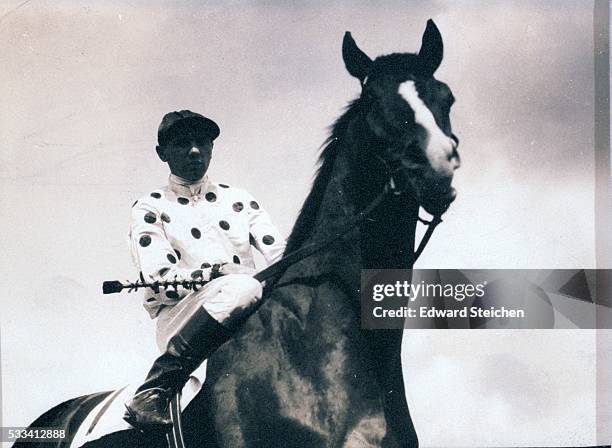 Jockey, Earl Sande on Triple Crown winning horse, Gallant Fox at Aqueduct Raceway.