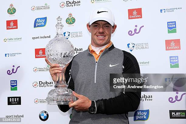 Rory McIlroy of Northern Ireland poses with the trophy following his victory during the final round of the Dubai Duty Free Irish Open Hosted by the...