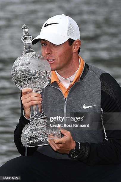 Rory McIlroy of Northern Ireland poses with the trophy following his 3 shot victory during the final round of the Dubai Duty Free Irish Open Hosted...