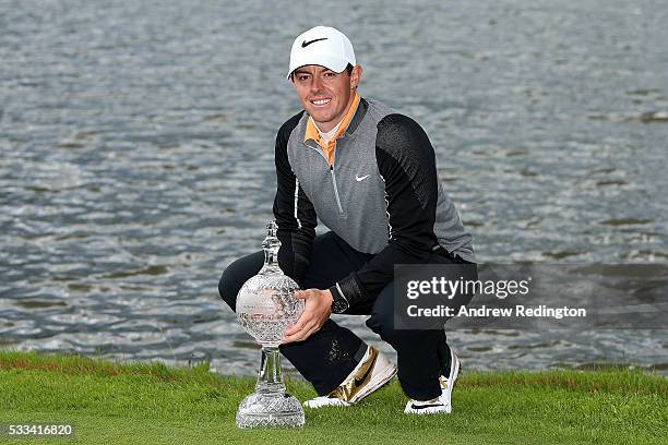 Rory McIlroy of Northern Ireland poses with the trophy following his 3 shot victory during the final round of the Dubai Duty Free Irish Open Hosted...