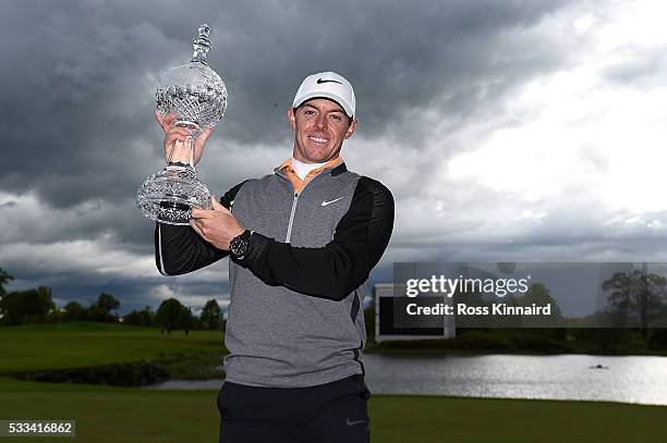 Rory McIlroy of Northern Ireland poses with the trophy following his 3 shot victory during the final round of the Dubai Duty Free Irish Open Hosted...