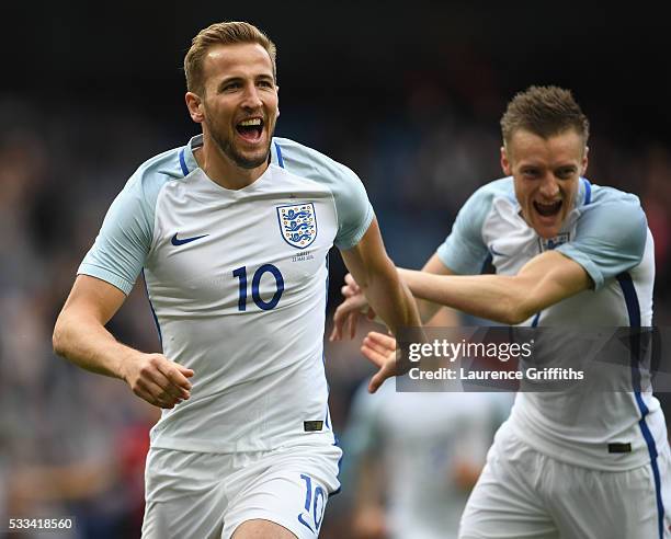 Harry Kane of England celebrates with Jamie Vardy of England after he scored the opening goal during the International Friendly match between England...