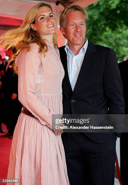German TV Presenter Johannes B. Kerner poses with his wife Britta Becker during the ceremony of the Sport Bild Award 2005 at the Restaurant Insel am...