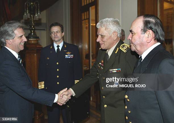 Uruguayan President Tabare Vazquez is greeted by armed forces commanders lieutenant general Angel Bertolotti , lieutenant general Enrique Bonelli and...