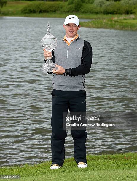 Rory McIlroy of Northern Ireland poses with the trophy after winning the Dubai Duty Free Irish Open Hosted by the Rory Foundation at The K Club on...