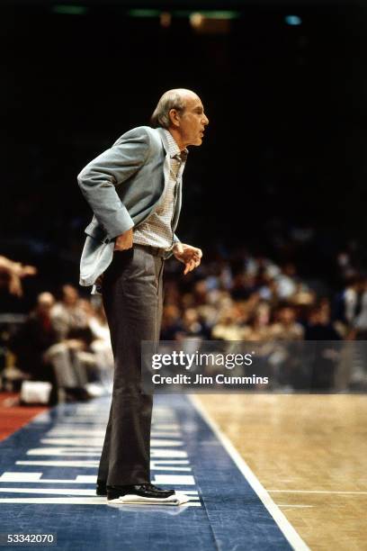 Head Coach Jack Ramsay of the Buffalo Braves signals for a play from courtside during an NBA game at the Buffalo Memorial Auditorium in Buffalo, New...