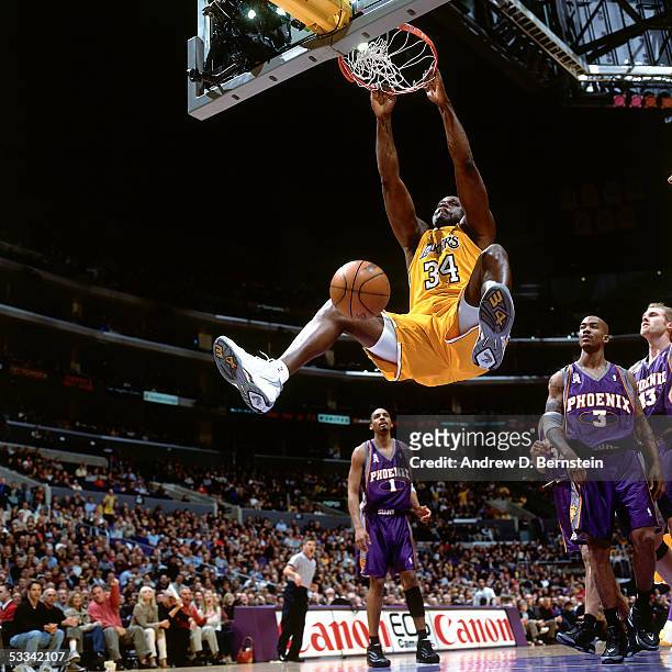 Shaquille O'Neal of the Los Angeles Lakers dunks against the Phoenix Suns during an NBA game circa 2004 at the Staples Center in Los Angeles,...