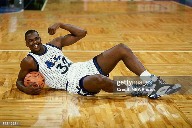 Shaquille O'Neal of the Orlando Magic poses for a portrait on the court at the TD Waterhouse Centre circa 1993 in Orlando, Florida. NOTE TO USER:...