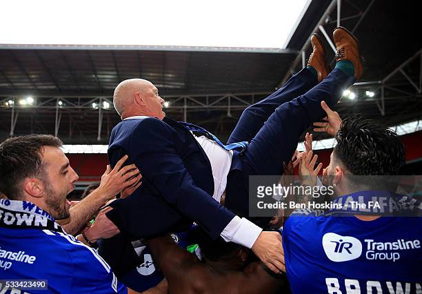 Halifax manager Jim Harvey is thrown in the air by his players following The FA Trophy Final between Grimsby Town FC and FC Halifax Town at Wembley...