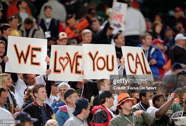 Cal Ripken Jr. #8 of the Baltimore Orioles is honored by the fans against the Boston Red Sox during a Major League baseball game October 6, 2001 at...