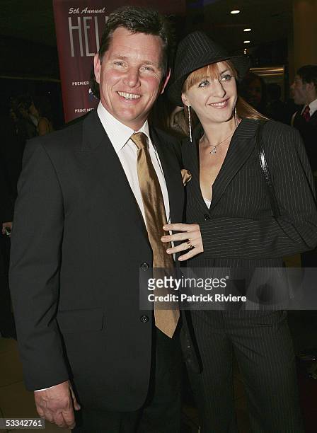 Actor Tom Burlinson arrives with his wife Mandy Carnie for the Helpmann Awards at the Lyric Theatre, Star City on August 08, 2005 in Sydney,...