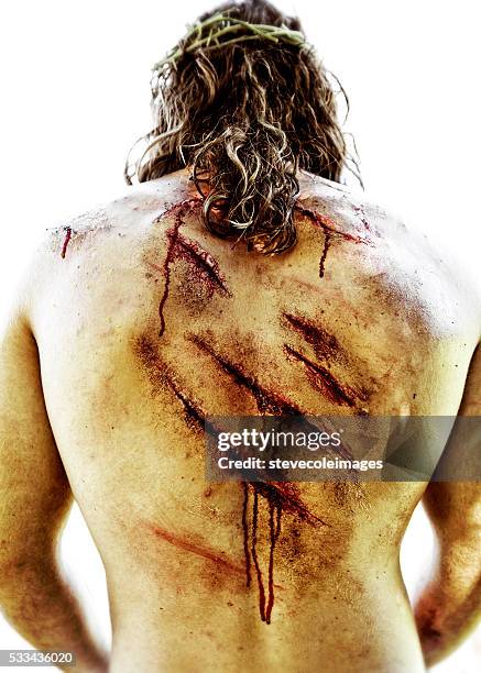 wounds on jesus christe back. - torture stock pictures, royalty-free photos & images