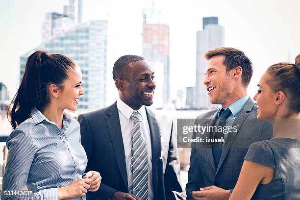 business people discussing outdoor - sales executive stockfoto's en -beelden
