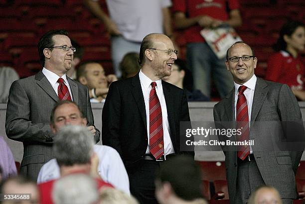 Joel Glazer, Avram Glazer and Bryan Glazer, sons of owner Malcolm Glazer, are seen before the Champions League third qualifying round, first leg...