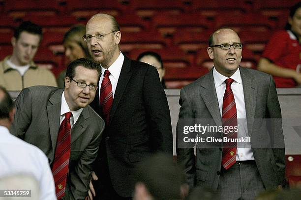 Joel Glazer, Avram Glazer and Bryan Glazer, sons of owner Malcolm Glazer, are seen before the Champions League third qualifying round, first leg...