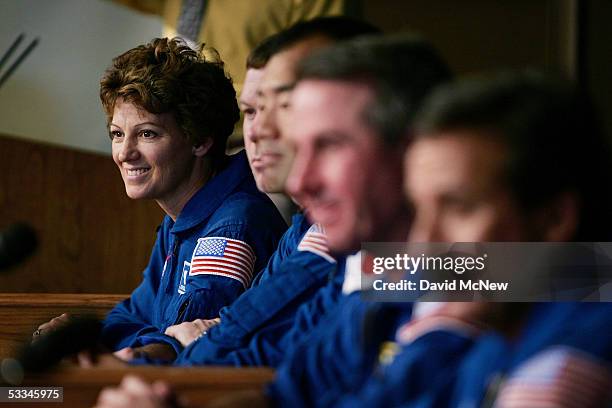 Commander Col. Eileen Collins and space shuttle Discovery crew members James Kelly, Japanese astronaut Soichi Noguchi, Stephen Robinson and Charles...