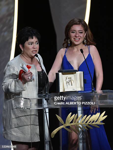 Filipino actress Jaclyn Jose celebrates on stage next to her daughter, Filipino actress Andi Eigenmann, after being awarded with the Best Actress...