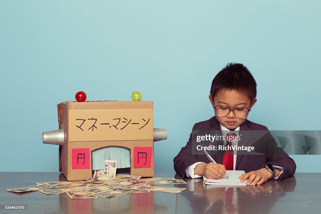 Young Japanese Boy is Making Money