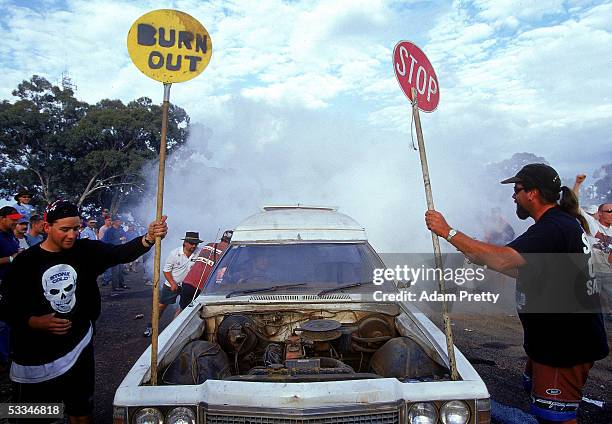 Fan prepares for a burnout in the donut pit during the 1999 FAI Bathurst 1000 at Mount Panorama November 14, 1999 in Bathurst, Australia.