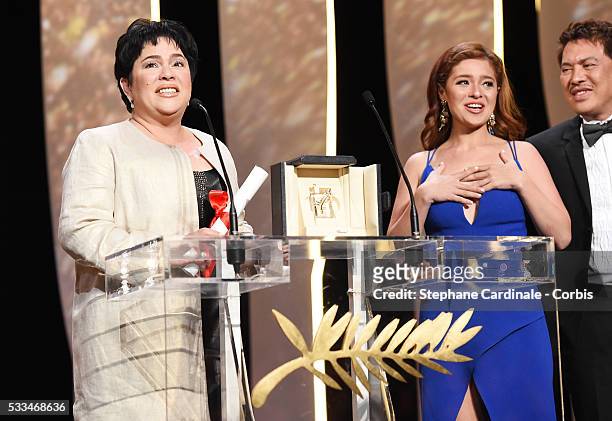 Jaclyn Jose reacts on stage as her daughter Andi Eigenmann and director Brillante Mendoza applaud after being awarded the Best Actress prize during...