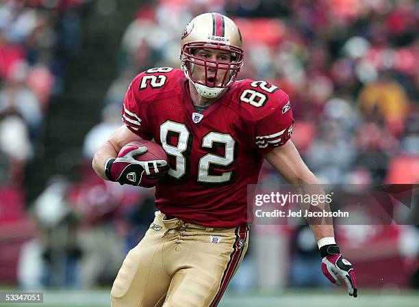 Tight end Eric Johnson of the San Francisco 49ers runs upfield against the Buffalo Bills at Monster Park on December 26, 2004 in San Francisco,...