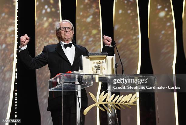 Director Ken Loach celebrates on stage after being awarded the Palme d'Or for the movie 'I, Daniel Blake' during the closing ceremony of the annual...