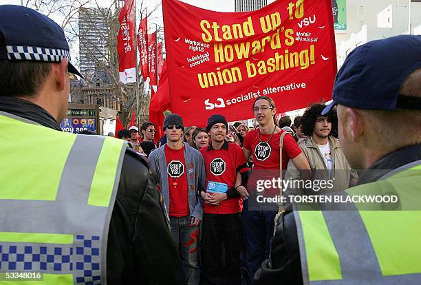 Students confront police during a rally in Sydney against voluntary student unionism legislation, which would mean university students would no...