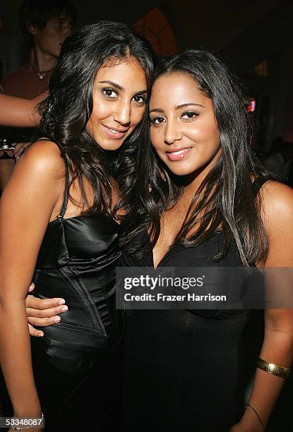 Adi schnall and sister Noa Schnall pose together at the after party for the premiere of 'Pretty Persuasion' at the Montmartre club on August 9, 2005...