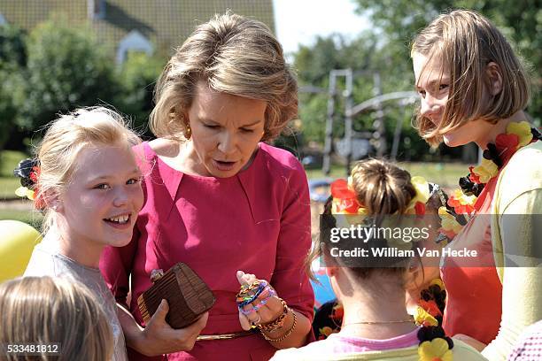 Queen Mathilde pictured during her visit to "Huis aan Zee" on July 3, 2014 in De Haan, Belgium. Queen Mathilde paid a visit to this center made to...