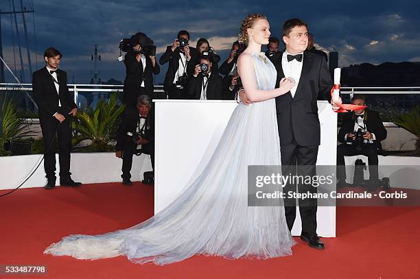 Actress Maria Dragus and Romanian director Cristian Mungiu winner of the Best Director prize for the film 'Graduation ' at the Palme D'Or Winner...