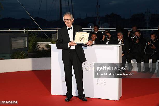 Director Ken Loach poses with The Palme d'Or for the movie 'I,Daniel Blake' at the Palme D'Or Winners Photocal during the 69th annual Cannes Film...