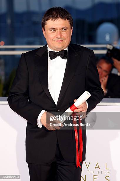 Romanian director Cristian Mungiu winner of the Best Director prize for the film 'Graduation ' at the Palme D'Or Winner Photocall during the 69th...