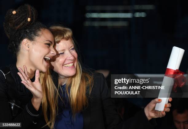 British director Andrea Arnold and US actress Sasha Lane pose after Arnold was awarded with the Jury Prize for the film "American Honey" on May 22,...