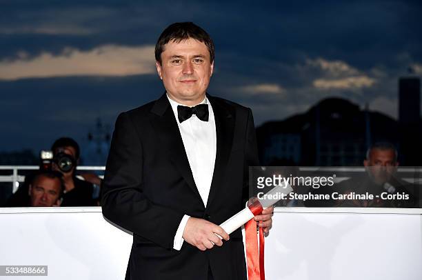 Romanian director Cristian Mungiu winner of the Best Director prize for the film 'Graduation ' at the Palme D'Or Winner Photocall during the 69th...