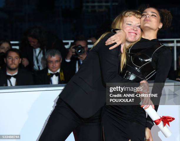 British director Andrea Arnold and US actress Sasha Lane pose after Arnold was awarded with the Jury Prize for the film "American Honey" on May 22,...