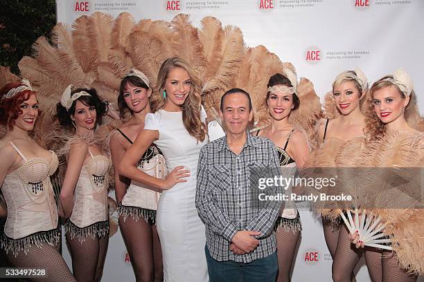 Event Host and Miss USA 2015, Olivia Jordan poses with actor Gilbert Gottfried during the 2016 ACE Moulin Rouge Gala at The High Line Hotel on May...