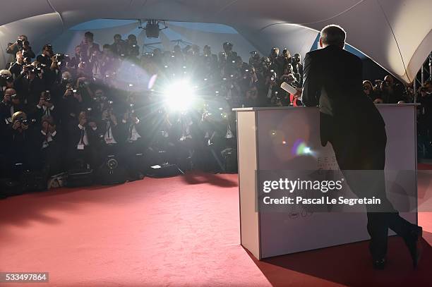 Director Olivier Assayas poses after being awarded the Best Director prize for the movie 'Personal Shopper' during the Palme D'Or Winner Photocall...