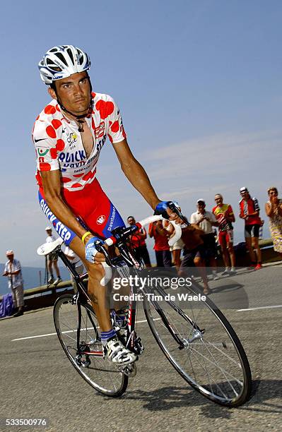 Richard Virenque sports the polka dot jersey as 'King of the Mountains' during stage 15 from Valreas to Villard-de-Lans in the 2004 Tour de France.