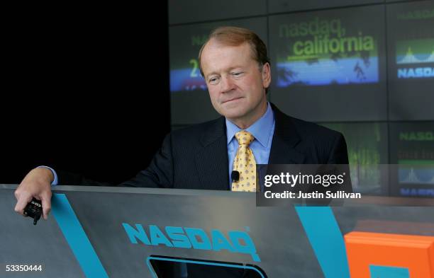 Cisco Systems President and CEO John Chambers prepares for the closing of the Nasdaq Stock Market which was broadcast via satellite from Cisco System...