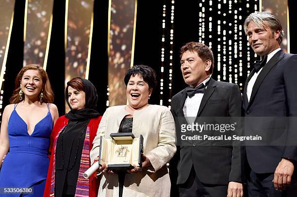 Filipino actress Jaclyn Jose poses on stage with her daughter Filipino actress Andi Eigenmann , Iranian producer and member of the Jury Katayoon...