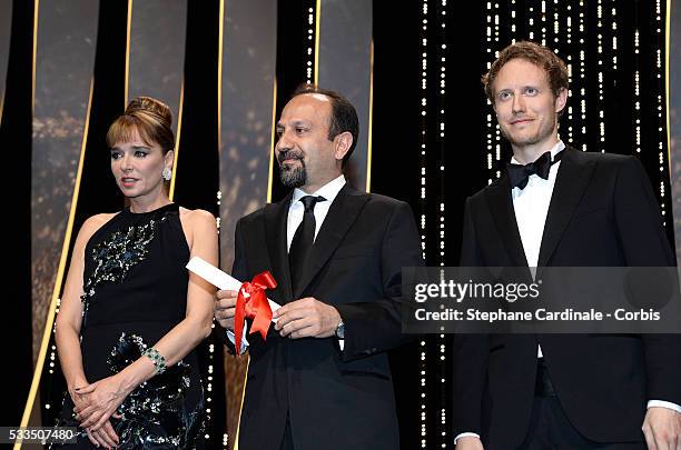 Jury Members Valeria Golino and Laszlo Nemes appear on stage with scriptwriter Asghar Farhadi winner of the best script award for the film 'The...