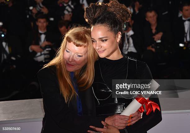 British director Andrea Arnold poses during a photocall with US actress Sasha Lane after she was awarded with the Jury Prize for the film "American...