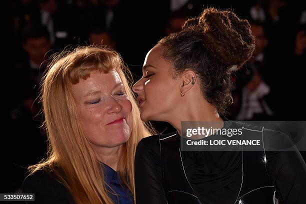 British director Andrea Arnold poses during a photocall with US actress Sasha Lane after she was awarded with the Jury Prize for the film "American...