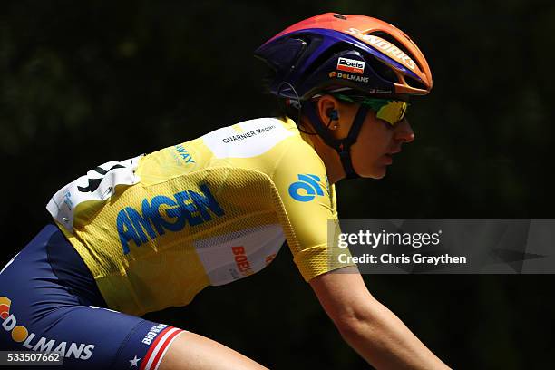 Megan Guarnier of the United States riding for team Boels-Dolmans Cycling Team in the yellow leader's jersey rides in the peloton during stage four...