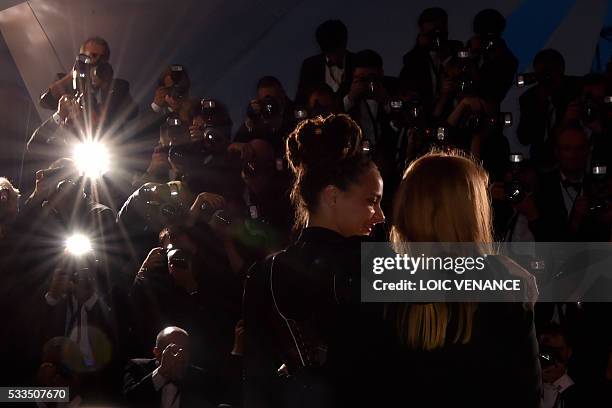 British director Andrea Arnold poses during a photocall with US actress Sasha Lane after she was awarded with the Jury Prize for the film "American...