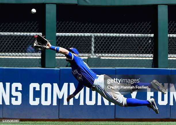 Kevin Pillar of the Toronto Blue Jays makes a catch in center field of the ball hit by Brian Dozier of the Minnesota Twins during the fifth inning of...