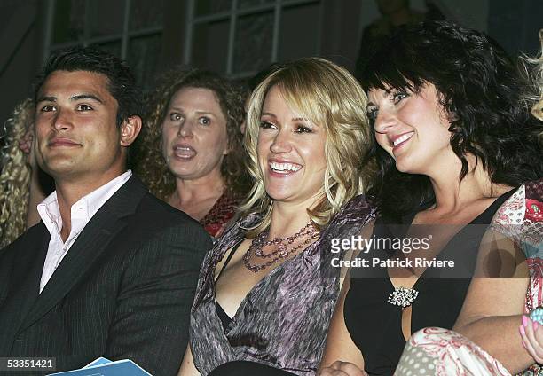 Rugby player Craig Wing, TV news reader Leila McKinnon and TV personality Sarah-Marie Fidele attend the fashion parade for David Jones Summer 2005...
