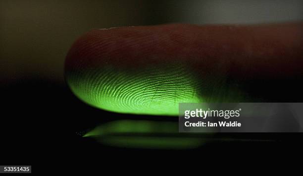 Fingerprint is scanned at Argus Soloutions August 11, 2005 in Sydney, Australia. The Australian Federal Government are considering including...